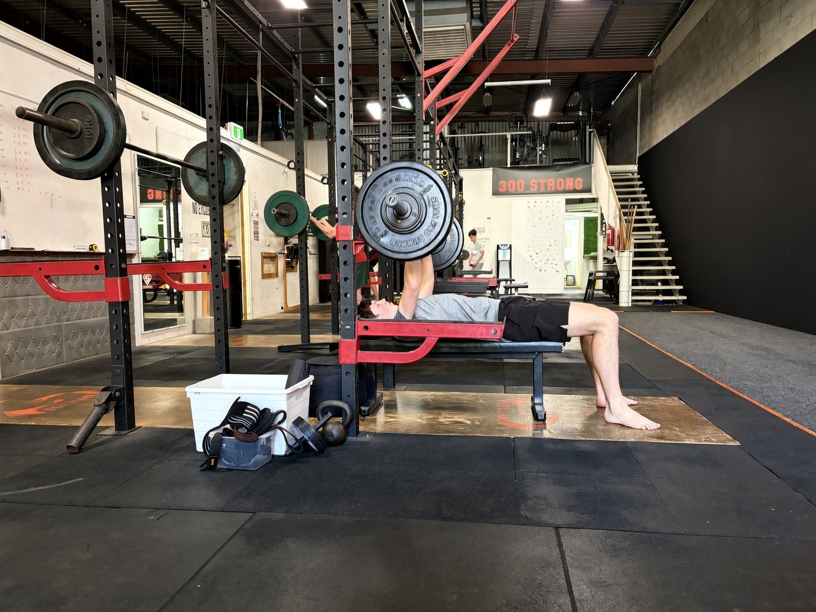 Teenagers pulling a deadlift